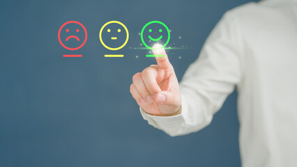Poster - Customer's hand is touching virtual screen on the happy smile face icon to give satisfaction in service. Concept of assessment testimonial customer service and feedback, Opinion rating very impressed.