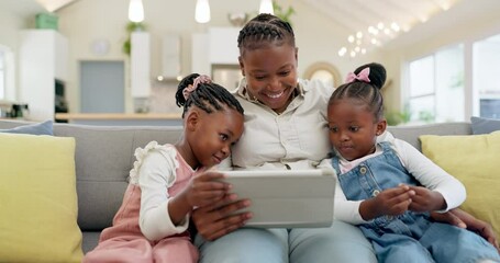 Wall Mural - Happy, mother with her girl child and tablet on sofa in living room of their home together. Technology or connectivity, learning or kissing and black family on couch streaming a movie in their house