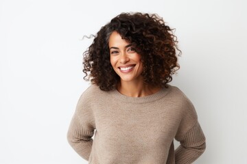 Wall Mural - Portrait of a beautiful young african american woman with curly hair smiling