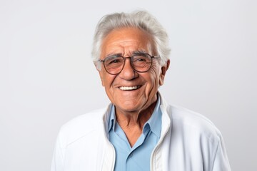 Portrait of happy senior man with eyeglasses on white background