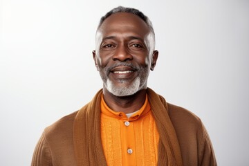 Wall Mural - Portrait of a smiling mature African-American man, isolated over white background