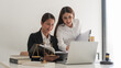 © snowing12 - Law concept, Two female lawyers discussing about contract and agreement of business in law firm