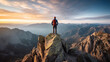 © Robert Kneschke - Hiker enjoying mountain top view at dusk or dawn