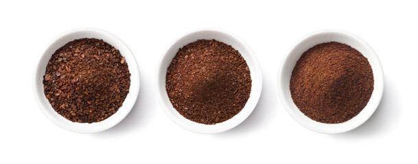 Wall Mural - Flat lay of Different types of grinds coffee in white bowl isolated on white background. Clipping path.