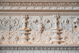 Fototapeta  - Detail of a bas-relief of a fireplace in an old house in France