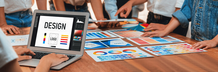 Aufkleber - Graphic designer brainstorming logo and graphic art at busy artistic workshop, laptop display workspace. Experimenting color palette and pattern for creative design. Panorama shot. Scrutinize