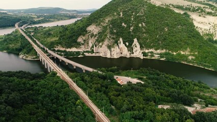 Wall Mural - wonderful rocks or chudnite skali, near asparuhovo village. aerial view of a bridge crossing the tso