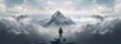 © jambulart - silhouette of a person on a mountain top