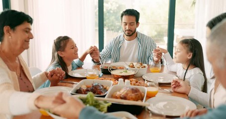Wall Mural - Children, parents and grandparents praying at thanksgiving together as a family for bonding or eating food in celebration. Love, lunch or brunch with kids and relatives saying grace in a dining room