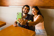 Attractive young couple taking a selfie during a date