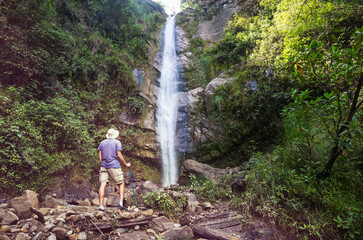 Sticker - Hiker near waterfall