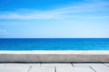 Poster - White Stone Table Top And Seascape Of The Blur Nature Background. High quality photo