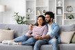 © Prostock-studio - Loving eastern millennial man and woman cuddling at home