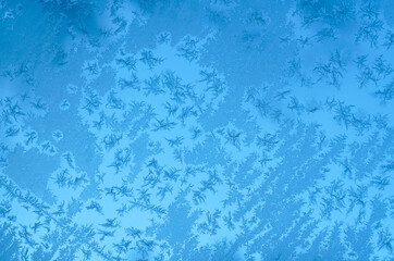 Poster - frost crystal on window glass in winter season