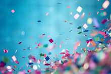 Colorful Confetti Falling On A Blue Background