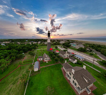 Tybee Lighthouse Museum Wide Angle With A Beautiful Sunset Illuminating The Cloud Deck