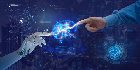 Hands of robot and human touch on artificial intelligence symbol. Concept of data network connection, data exchange, deep machine learning, science, artificial intelligence technology and innovation.