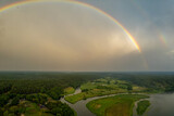 Fototapeta Tęcza - Aerial summer storm rainbow view of Merkine, Merkys and Nemunas rivers, Lithuania