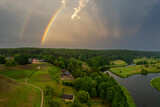 Fototapeta Tęcza - Aerial summer storm rainbow view of Merkine, Merkys and Nemunas rivers, Lithuania