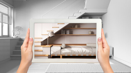 Wall Mural - augmented reality concept. hand holding tablet with ar application used to simulate furniture produc