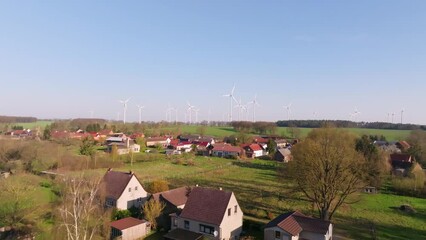 Wall Mural - Aerial flight over a wind farm in Germany.