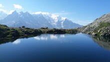 Lake Blanc At The End Of Tour Mont Blanc, Surrounded With Snowy Mountains