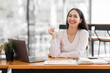 © David - Excited happy Asian woman looking at the phone screen, celebrating an online win, overjoyed young asian female screaming with joy, isolated over a white blur background