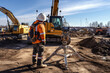© arhendrix - Construction engineer wear safety uniform under inspection and survey workplace by tablet with excavation truck digging and worker , offshore construction background.