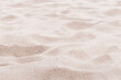 Leinwandbild Motiv Beige pink Sand texture natural background. Close up waves pattern on sand dunes, light pastel color, minimal nature beautiful beach. Summer and travel, spa and relaxation concept. Selective focus.