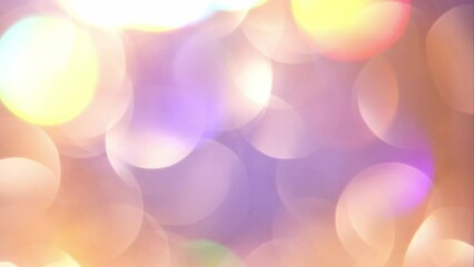 Wall Mural - Gold Bokeh Shimmers with colorful tints shades. Blurred bokeh lights particles abstract motion background. Defocused shiny sparkling circles as a Christmas symbols.