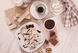 Fototapeta Uliczki - Neapolitan wafers filling with hazelnut-chocolate cream.
