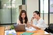 © Wasana - Two colleague businesswoman are meeting online, marketing plan, business plan, checking statistics and accounting.