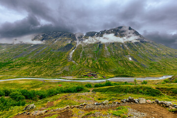 Wall Mural - Galdhopiggen, Norway - July 3rd, 2023: The mountain landscape on the hike to the peak of Galdhopiggen In Jotunheimen National Park, Norway