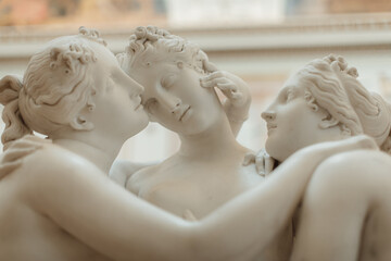 Three classical antique marble sculpture of a women in the State Hermitage Museum in St.Petersburg, Russia. Beige minimalistic indoor style