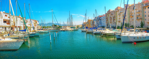 Wall Mural -  Cityscape with marina in Empuriabrava town. Costa Brava, Catalonia, Spain