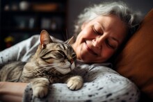 A Cute Cat Is A Favorite Pet Of An Adult Woman. Portrait With Selective Focus