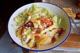 Fototapeta Na drzwi - salad with vegetables and cheese