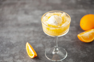 Wall Mural - Homemade orange creamsicle in glass. Frozen orange juice with ice cream. Summer dessert.