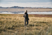 Girl Traveler Walks Through The Area Near The Lake TuzKol