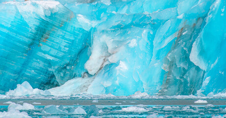 Wall Mural - a close-up of the layered surface of a blue glacier - knud rasmussen glacier near kulusuk - greenlan