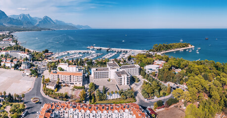 Poster - the essence of Kemer resort town, Turkey's coastal charm with our breathtaking aerial image showcasing its scenic landscapes and vibrant blue waters.