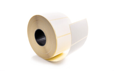 Barcode sticker roll for product price isolated on white background. Blank adhesive empty labels on bobbin. Paper tags for marking and identification