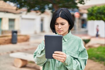 Sticker - Young chinese woman using touchpad at park