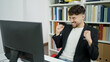 © Krakenimages.com - Young arab man student using computer studying at university classroom