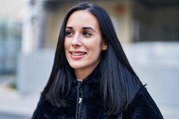 Sticker - Young caucasian woman smiling confident looking to the side at street