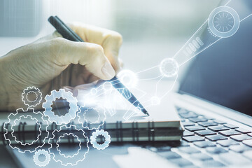 Aufkleber - Creative abstract robotics technology hologram and hand writing in diary on background with laptop, artificial intelligence and machine learning concept. Multi exposure