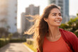 © BrightSpace - Vibrant Midlife Woman Exercising Outdoors: Beautiful Lady portrait people jogging with Freshness in Urban Park with Trees and Buildings with bright sun and nature light, healthy concept, gen ai