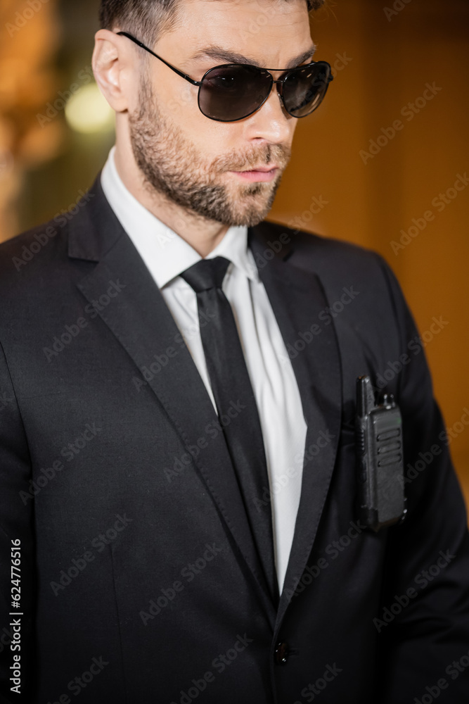 Photo Stock handsome bodyguard, security guard in suit with tie and ...