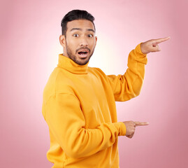 Aufkleber - Surprise, pointing and wow with portrait of man in studio for show, announcement and deal. News, advertising and idea with person on pink background for promotion, information and solution mockup