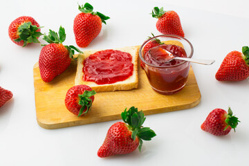 Wall Mural - A bird's-eye view of the strawberry jam-filled bread and strawberry fruit